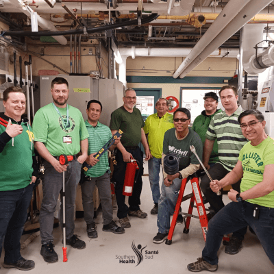 Group of staff wearing green shirts in support of organ donor awareness and registration